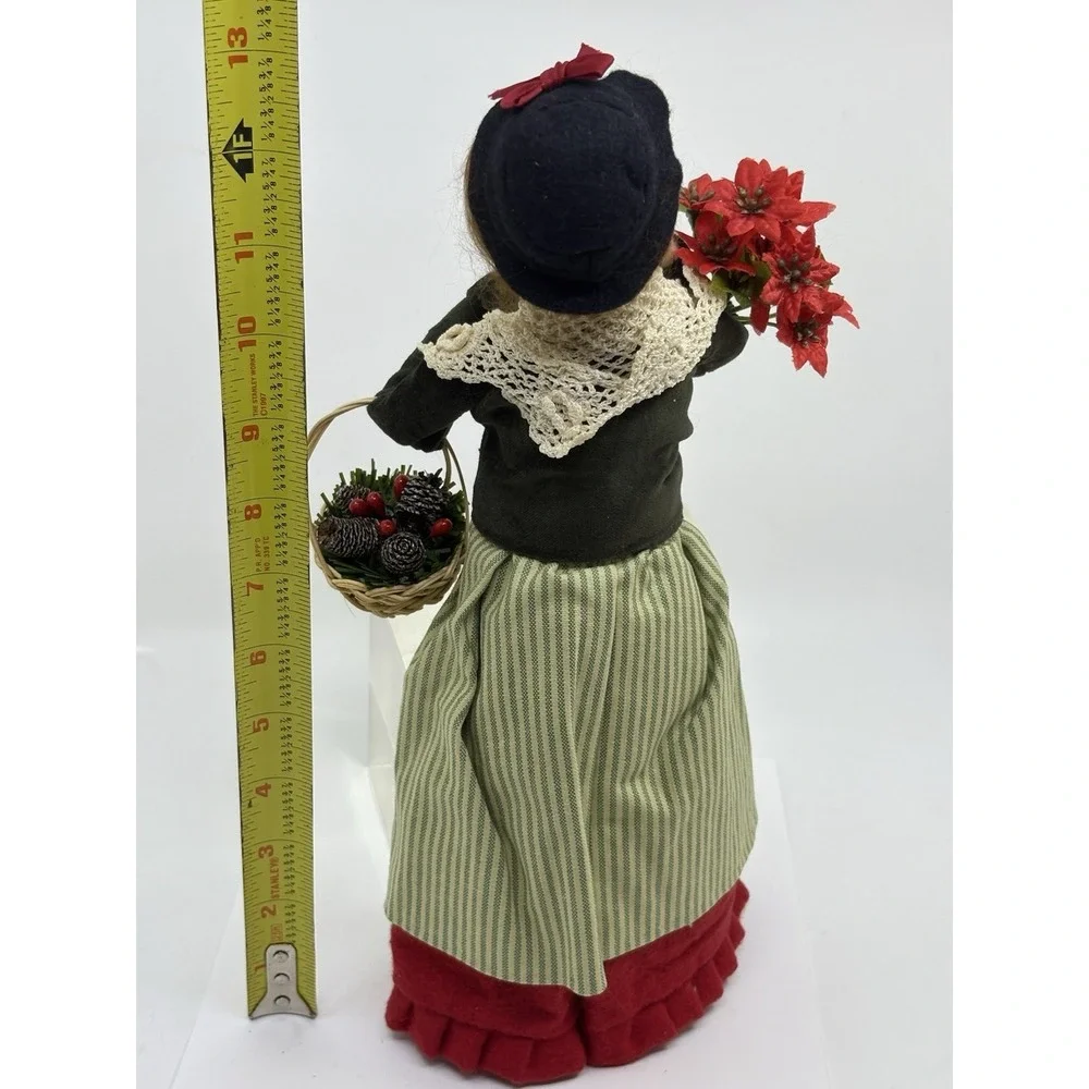 2009 Woman Selling Holiday Flowers By Buyers choice The Carolers